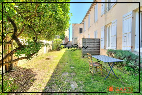 Ensemble immobilier composé de quatre maisons