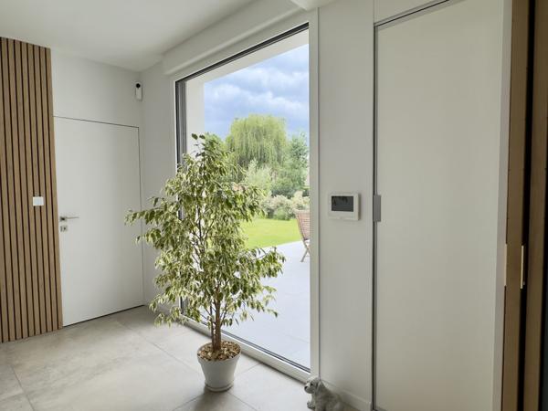 MAISON INDIVIDUELLE CONTEMPORAINE SEMI- PLEIN PIED AU BOURG DE MARCQ
