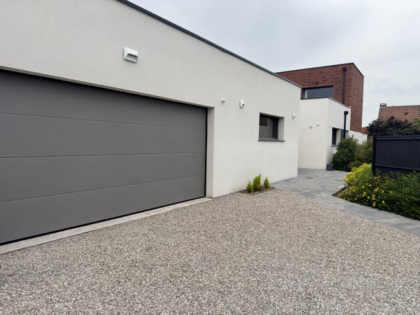 MAISON INDIVIDUELLE CONTEMPORAINE SEMI- PLEIN PIED AU BOURG DE MARCQ