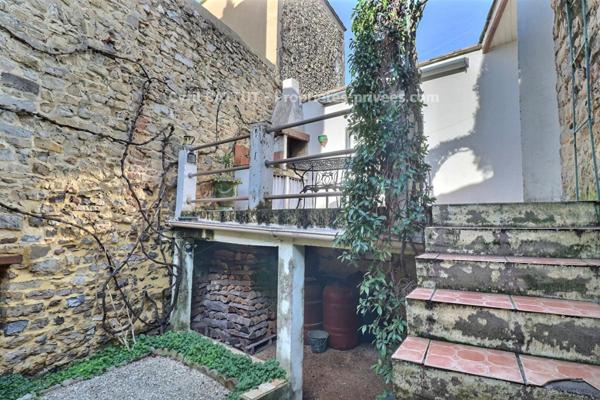 Maison de village rénovée avec terrain constructible - Lédignan