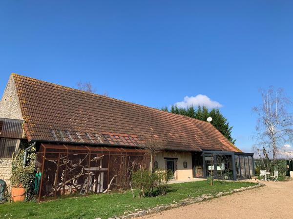 Magnifique ensemble Bressan situé dans un écrin de verdure