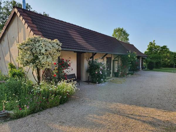 Magnifique ensemble Bressan situé dans un écrin de verdure