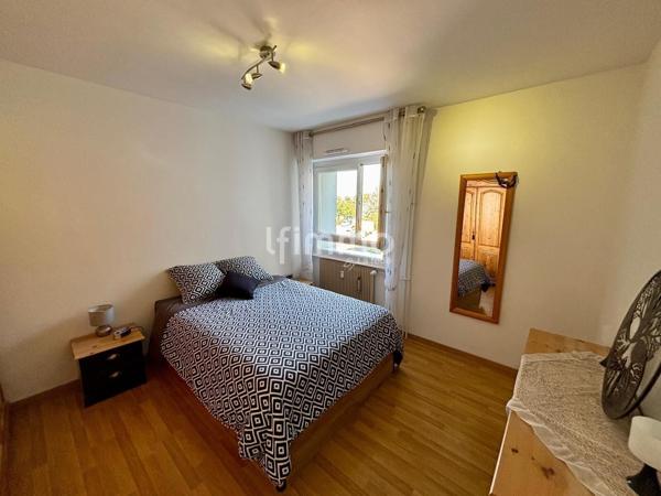 Appartement loué T3 avec balcon, cave, loggia et parking.