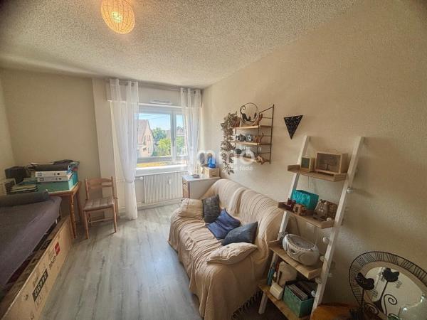Appartement loué T3 avec balcon, cave, loggia et parking.
