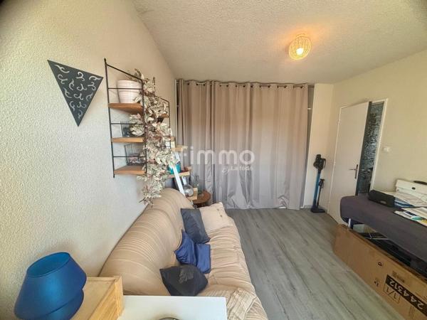 Appartement loué T3 avec balcon, cave, loggia et parking.