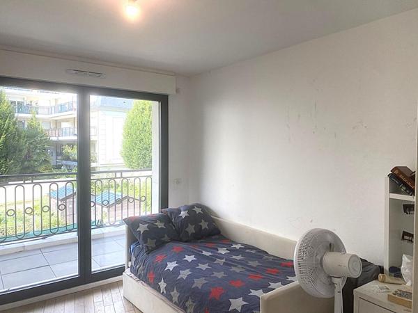 Somptueux duplex 4 pièces situé en rez-de-jardin à vendre à Puteaux