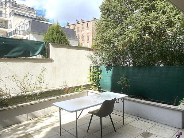 Somptueux duplex 4 pièces situé en rez-de-jardin à vendre à Puteaux