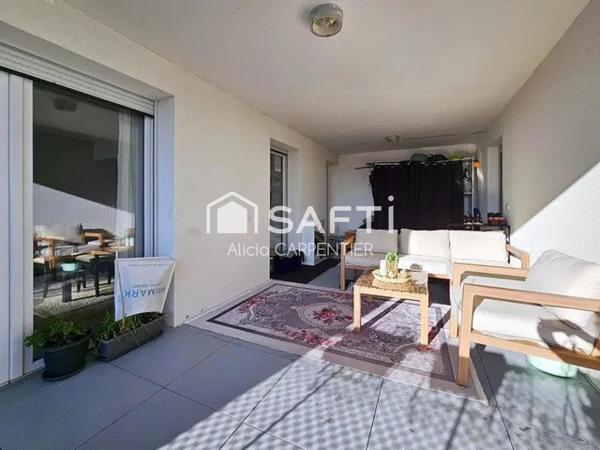 Appartement T4 avec une spacieuse loggia et une place de parking privative