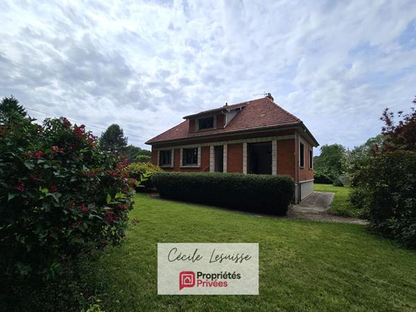 Pavillon sur sous-sol complet avec dépendances et garages