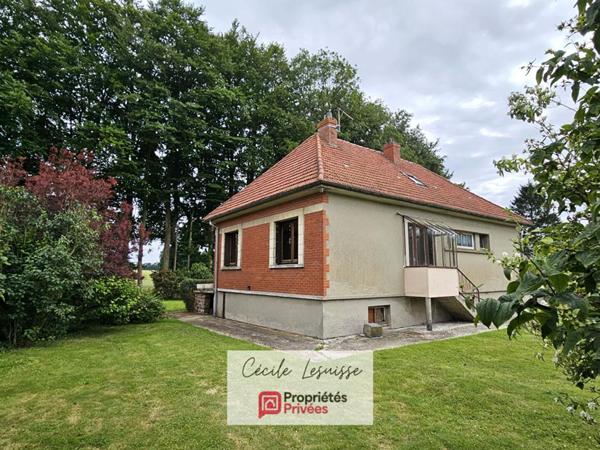 Pavillon sur sous-sol complet avec dépendances et garages