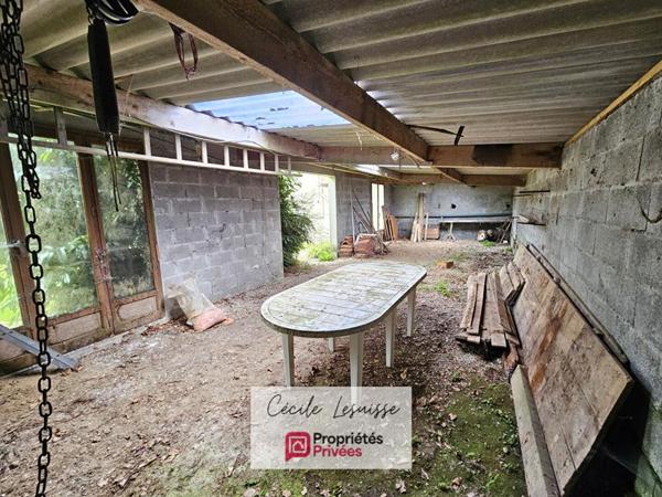 Pavillon sur sous-sol complet avec dépendances et garages
