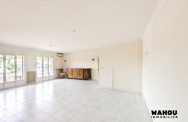 Appartement T4 de 160 m² avec jardin et hangar