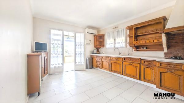 Appartement T4 de 160 m² avec jardin et hangar