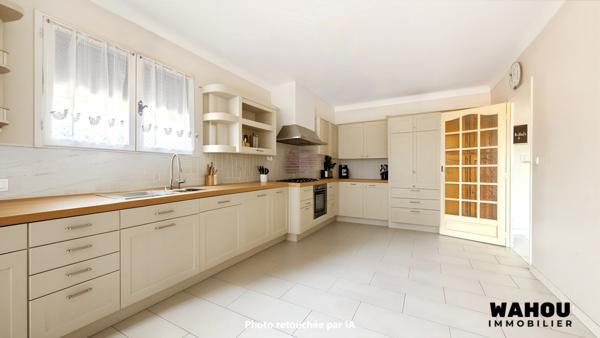 Appartement T4 de 160 m² avec jardin et hangar
