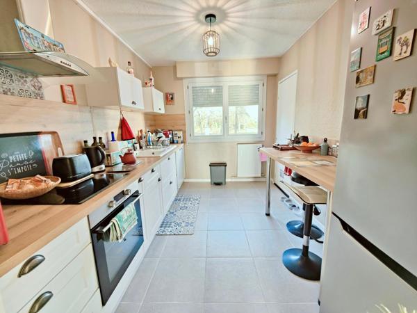 T4 rénové avec goût, ascenseur, au calme, cave