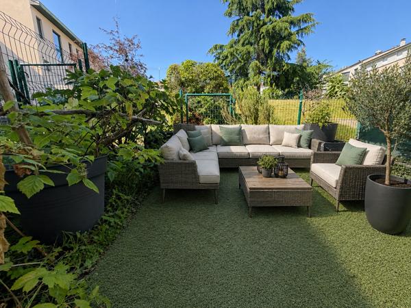 BEL APPARTEMENT TRAVERSANT D'ENVIRON 100 M2 AVEC TERRASSE, JARDIN PRIVATIF ET GARAGE