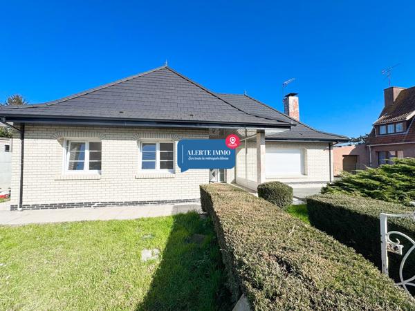 Maison individuelle plain pied de 130 m2, 3 chambres, jardin, cave, 2 places de parking