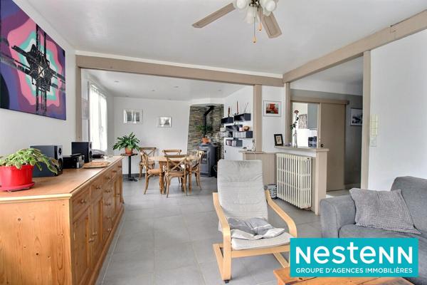 Maison plain-pied avec grand terrain de 836m² et garage à Décines-Charpieu