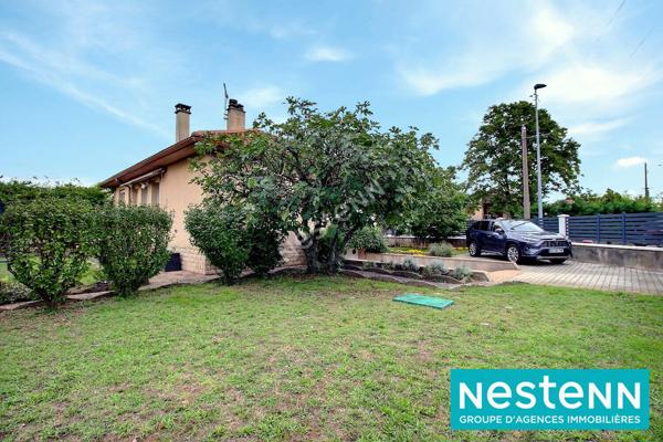 Maison plain-pied avec grand terrain de 836m² et garage à Décines-Charpieu
