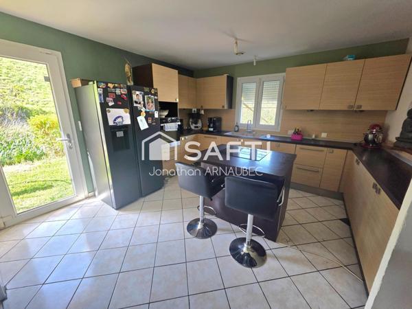 Maison autonome avec revenus solaires et terrain constructible