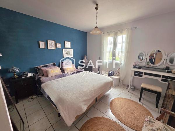 Maison autonome avec revenus solaires et terrain constructible