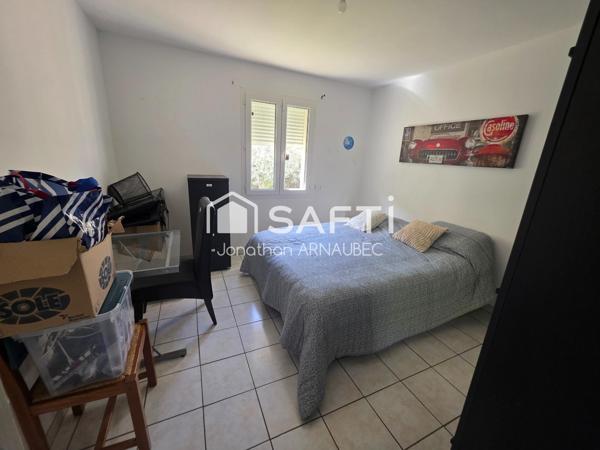 Maison autonome avec revenus solaires et terrain constructible