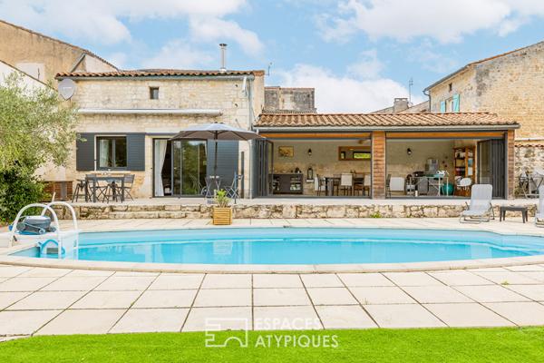 Ancien chai rénové et sa maison charentaise