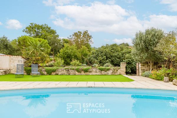 Ancien chai rénové et sa maison charentaise