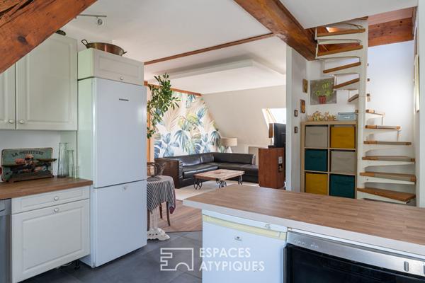 Dernier étage et son jardin au coeur du Conseil des XV