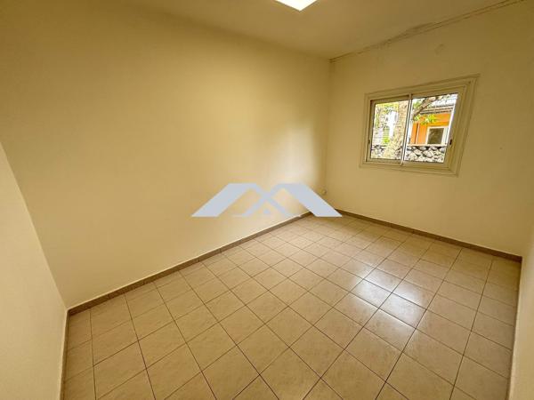 Appartement T4 en rez-de-chaussée avec jardin – Centre-ville de Saint-Joseph