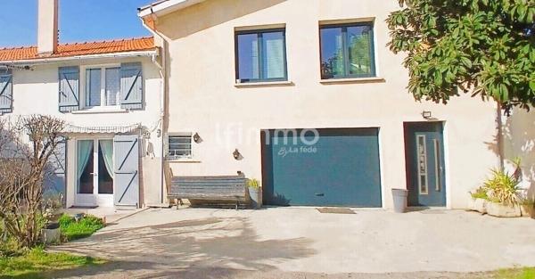 Ensemble de 2 maisons mitoyennes, tram à 100 m, fort potentiel à Cenon