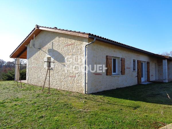 Maison de plain-pied avec 3 chambres, garage et jardin