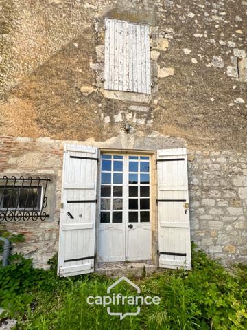 Maison en pierre à rénover avec fort potentiel en plein cœur de Puymirol