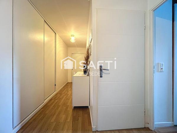 Appartement familial récent avec loggia et parking