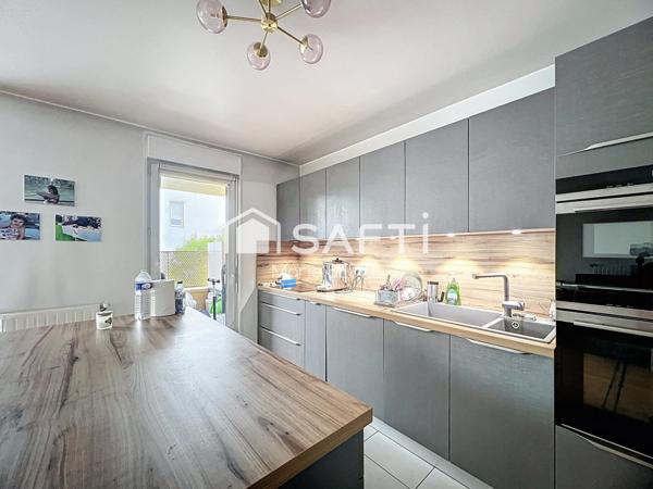 Appartement familial récent avec loggia et parking