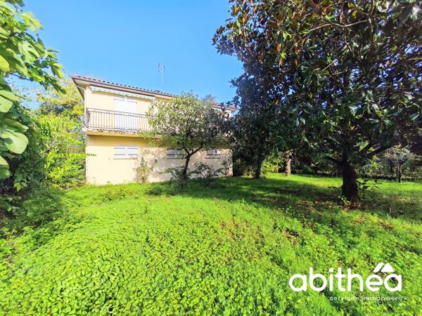 LIBOURNE – L'ÉPINETTE : UNE MAISON FAMILIALE AUX BEAUX VOLUMES, AU CŒUR D'UN ÉCRIN DE VERDURE