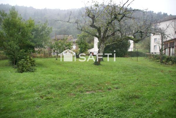 Grande maison avec joli terrain constructible