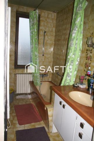 Grande maison avec joli terrain constructible