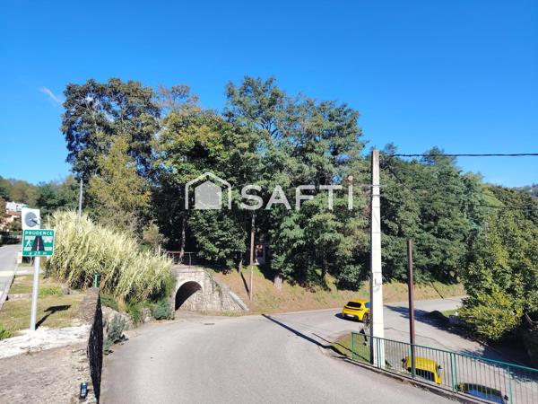 Grande maison avec joli terrain constructible