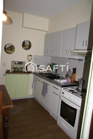 Grande maison avec joli terrain constructible