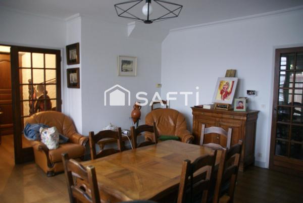 Grande maison avec joli terrain constructible