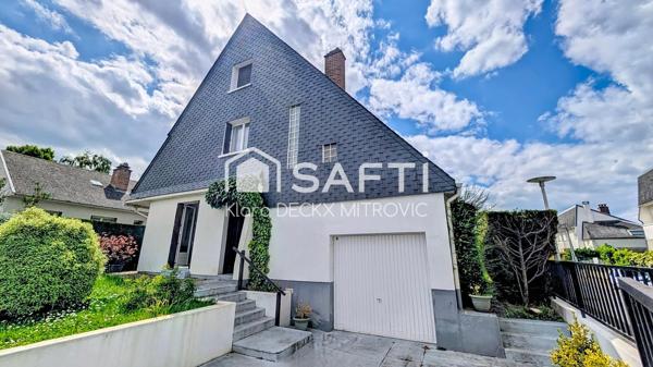 Maison 3 chambres, garage et jardin.