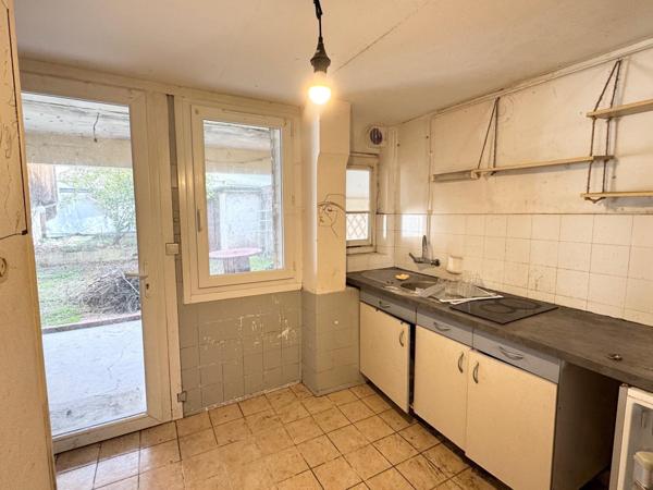 Maison divisée en 3 logements - Brive centre