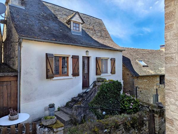 Maison de village en pierre avec 3 chambres, garage double, cave et terrasses