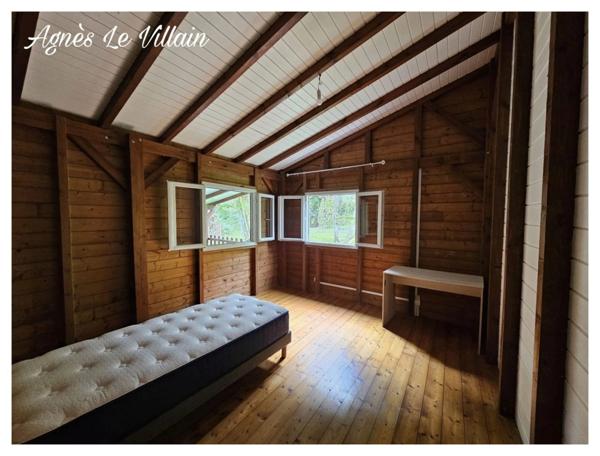 Maison en bois sur Terrain Arboré