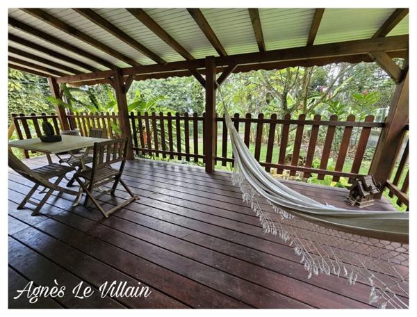 Maison en bois sur Terrain Arboré