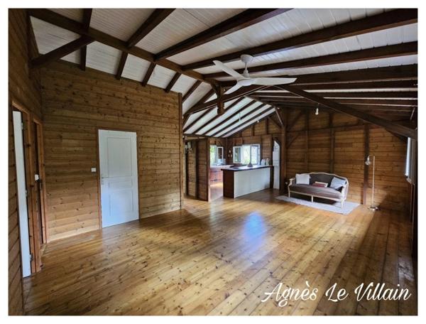 Maison en bois sur Terrain Arboré
