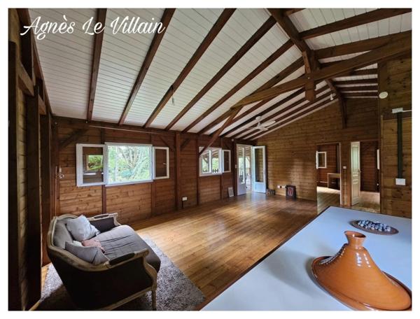 Maison en bois sur Terrain Arboré