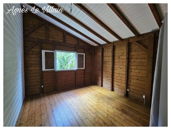 Maison en bois sur Terrain Arboré