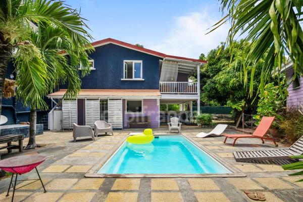 À Vendre – Charmant Appartement T2 Meublé avec Terrasse et Vue Mer – Case Pilote, Quartier Fond-Boucher